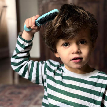 Kent Brushes Peter Rabbit™ Lifestyle - boy with Peter Rabbit™ hairbrush